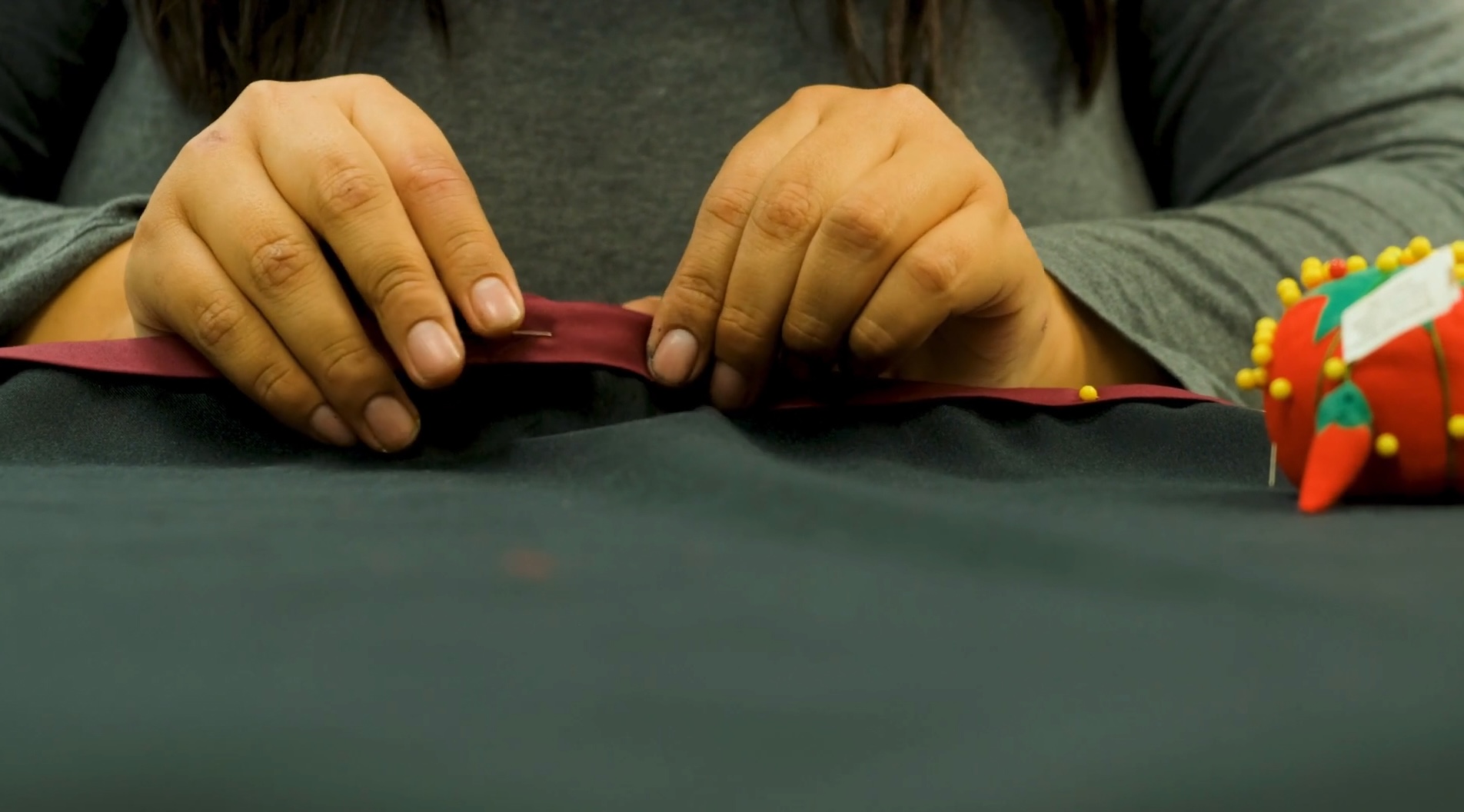 Person holding fabric